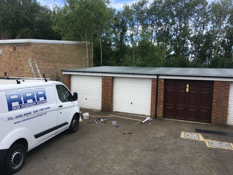 Rob Robinson's van outside a garage where an asbestos roof has been removed in Kettering, Northamptonshire.
