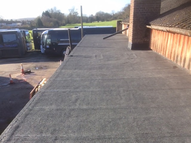 Commercial flat roof repair of an old building in Kettering, Northamptonshire.