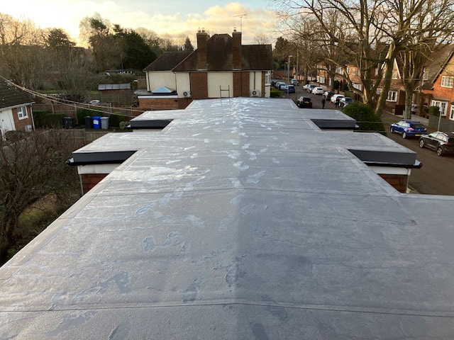 Finished commercial flat roof repair of garages in Kettering, Northamptonshire.