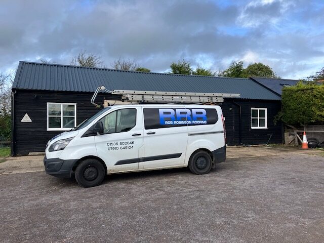 Rob Robinson's Van Pictured Outside a Barn Converison with a New Roof Installation UK.
